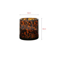 Amber colored glass with colored dot tumbler